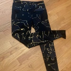 Noli leggings. black/grey camo with gold details. Size medium. Great condition.